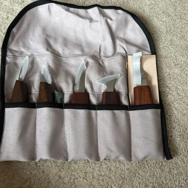 Verified buyer photo of the CarveKind carving knives with their case, submitted by a buyer in Canada